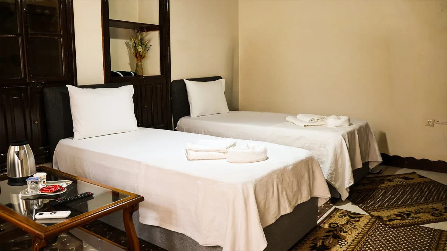 Beds and side table in the Sedir Room
